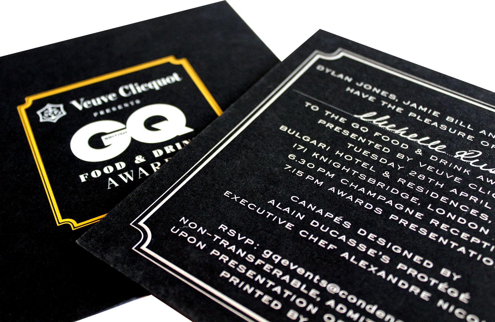 upmarket printed invitations on black card, with gold foil and white embossing