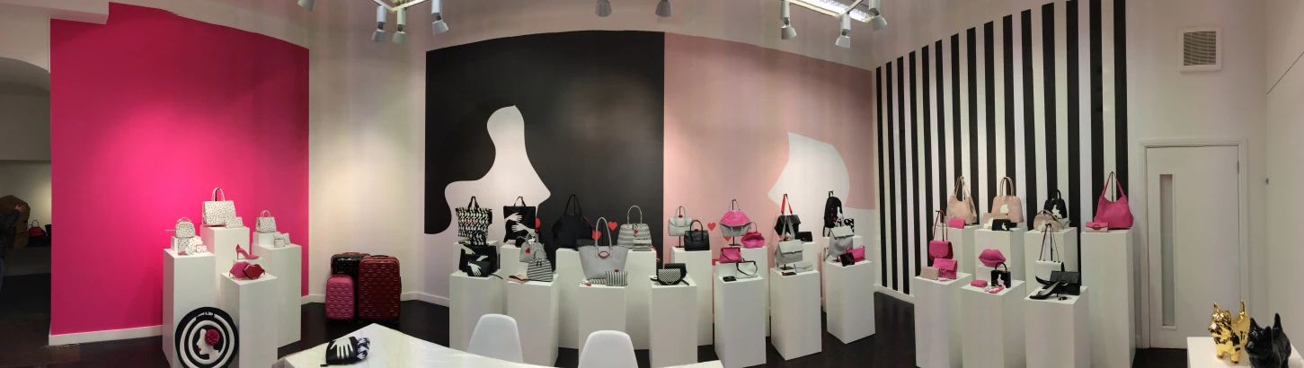 Custom printed wallpaper and plinths installed for an upmarket retail display by City Images
