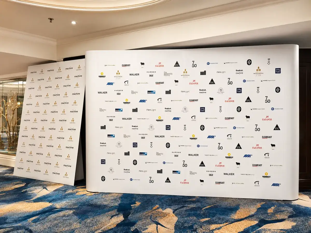 Step and repeat sponsor backdrop wall installed in a hotel function room for an awards evening