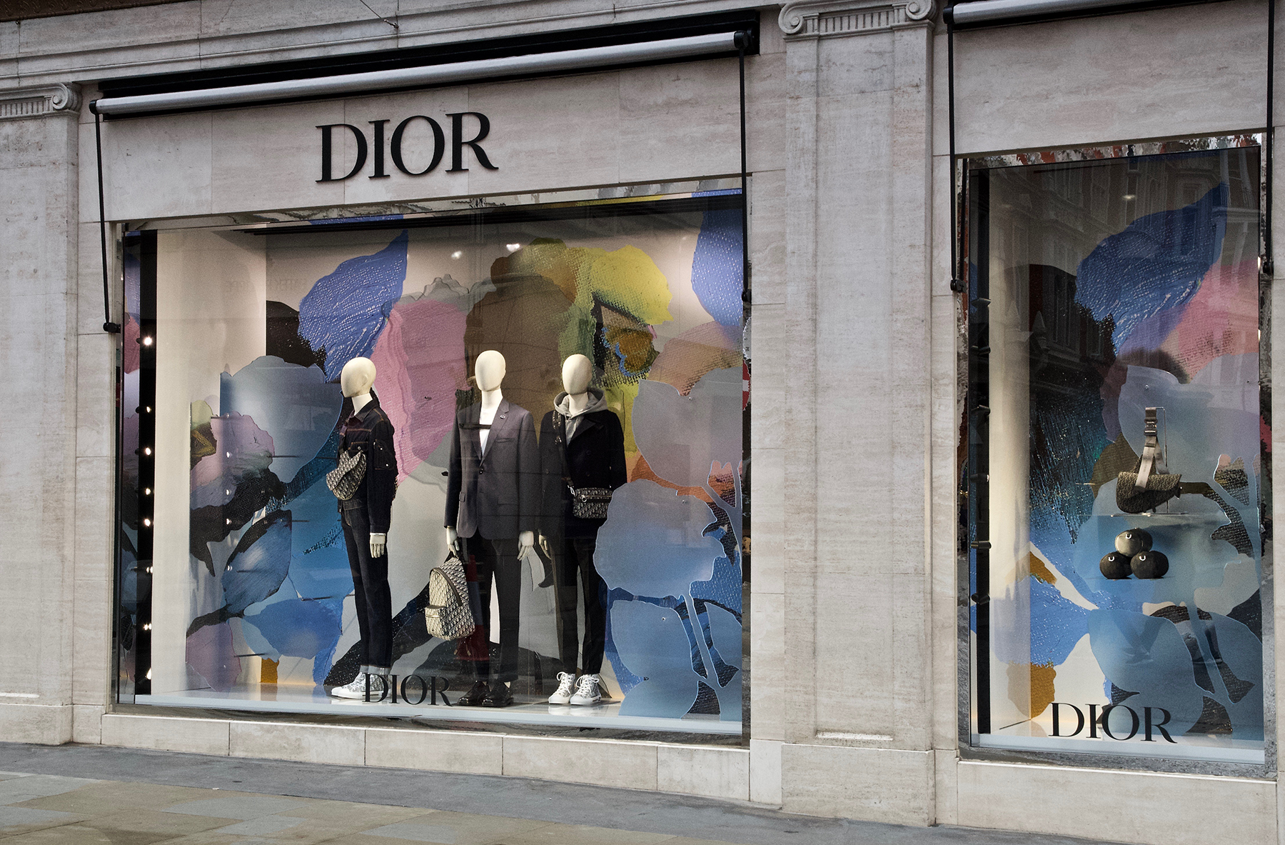 beautiful retail display window with custom printed POS items, and fret cut vinyl